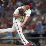 
              Atlanta Braves relief pitcher Will Smith throws in the eighth inning of a baseball game against the San Francisco Giants Monday, June 20, 2022, in Atlanta. (AP Photo/Hakim Wright Sr.)
            
