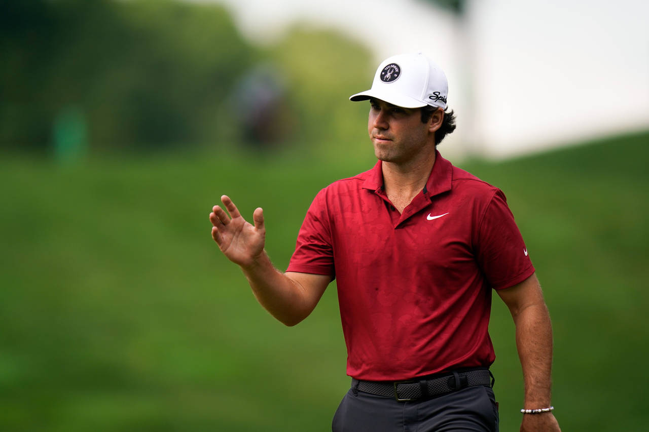 Matthew Wolff reacts after a shot on the 11th hole during the second round of the Travelers Champio...