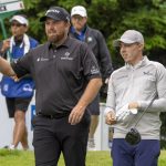 
              Shane Lowry, left, of Ireland and Matt Fitzpatrick of England chat as they walk off the 17th tee during the first round of the Canadian Open in Toronto on Thursday, June 9, 2022. (Frank Gunn/The Canadian Press via AP)
            