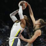 
              Las Vegas Aces' Theresa Plaisance, right, guards Dallas Wings' Kayla Thornton (6) during the first half of a WNBA basketball game Sunday, June 5, 2022, in Las Vegas. (AP Photo/John Locher)
            