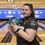 
              Maria Bulanova, a member of the Professional Women's Bowling Association and an assistant bowling coach at St. Francis College poses for a portrait before practice at Kingpin's Alley and Family Center, Wednesday, June 15, 2022, in Glens Falls, N.Y.  Title IX has opened the door for thousands of female athletes from abroad to get an American education and a shot at a life and career in the United States. (AP Photo/Hans Pennink)
            