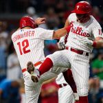 
              Philadelphia Phillies' Rhys Hoskins, right, celebrates with Kyle Schwarber after hitting a three-run home run offMiami Marlins' Trevor Rogers during the fourth inning of a baseball game Tuesday, June 14, 2022, in Philadelphia. (AP Photo/Matt Rourke)
            