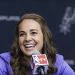 
              FILE - In this Aug. 5, 2014, file photo, Becky Hammon takes questions from the media at the San Antonio Spurs practice facility after being introduced as an assistant coach with the team, in San Antonio.  (AP Photo/Bahram Mark Sobhani, File)
            