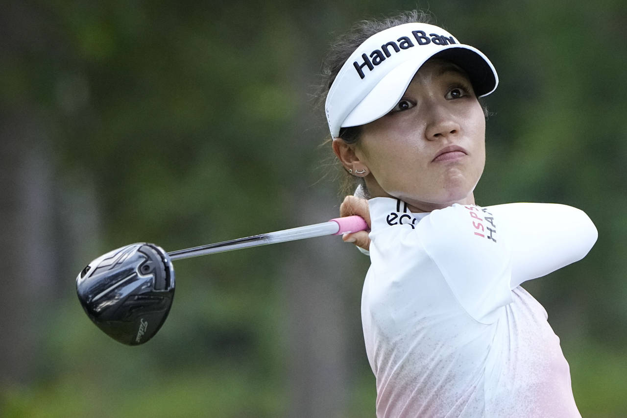 Lydia Ko, of New Zealand, watches her shot off the fourth tee during a practice round for the the U...
