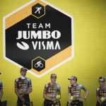 
              Belgium's Wout van Aert, center, Denmark Joans Vingegaard, second right, Slovenia's Primoz Roglic, far right, and Sepp Kuss of the U.S., far left, line up during the team presentation ahead of the Tour de France cycling race in Copenhagen, Denmark, Wednesday, June 29, 2022. The race starts Friday, July 1, the first stage is an individual time trial over 13.2 kilometers (8.2 miles) with start and finish in Copenhagen. (AP Photo/Daniel Cole)
            