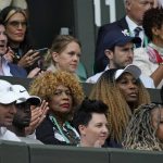 
              Oracene Price, center, the mother, and Venus Williams, the sister of Serena Williams of the US watch as she plays France's Harmony Tan in a first round women's singles match on day two of the Wimbledon tennis championships in London, Tuesday, June 28, 2022. (AP Photo/Alberto Pezzali)
            