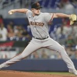 
              San Francisco Giants starting pitcher Logan Webb (62) throws a pitch during the first inning of a baseball game against the Miami Marlins, Saturday, June 4, 2022, in Miami. (AP Photo/Marta Lavandier)
            