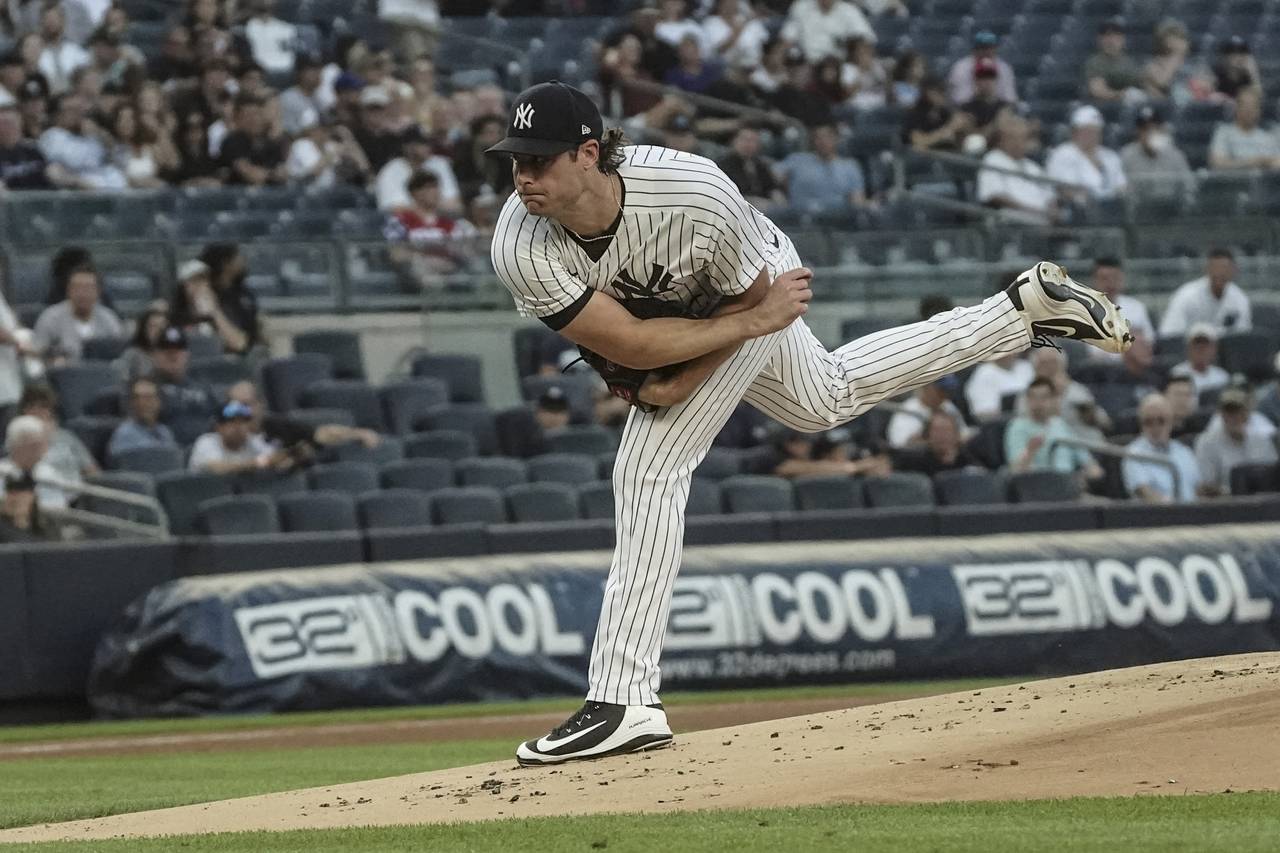 New York Yankees pitcher Gerrit Cole (45) throws a strike in the first inning of a baseball game ag...