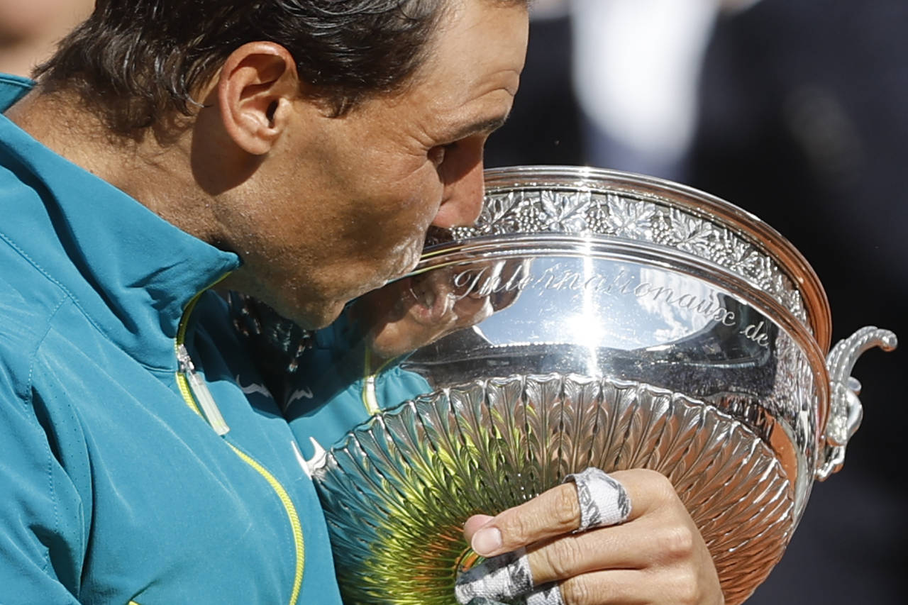 Spain's Rafael Nadal kisses the cup after defeating Norway's Casper Ruud in their final match of th...