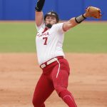 
              Oklahoma's Hope Trautwein (7) pitches in the second inning of an NCAA softball Women's College World Series game against Northwestern on Thursday, June 2, 2022, in Oklahoma City. (AP Photo/Alonzo Adams)
            
