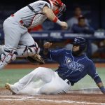 
              Tampa Bay Rays' Manuel Margot is forced out at home by St. Louis Cardinals catcher Andrew Knizner during the sixth inning of a baseball game Wednesday, June 8, 2022, in St. Petersburg, Fla. (AP Photo/Scott Audette)
            
