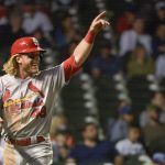 
              St. Louis Cardinals' Harrison Bader celebrates scoring during the 11th inning on a double by Brendan Donovan during a baseball game, Sunday, June 5, 2022, at Wrigley Field in Chicago. (AP Photo/Mark Black)
            