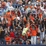
              Oregon State fans cheer on the team against Florida during the second inning of an NCAA softball Women's College World Series game Thursday, June 2, 2022, in Oklahoma City. (AP Photo/Alonzo Adams)
            