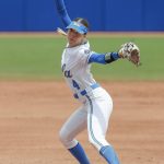 
              UCLA's Holly Azevedo (4) pitches in the first inning of an NCAA softball Women's College World Series game against Florida on Sunday, June 5, 2022, in Oklahoma City. (AP Photo/Alonzo Adams)
            