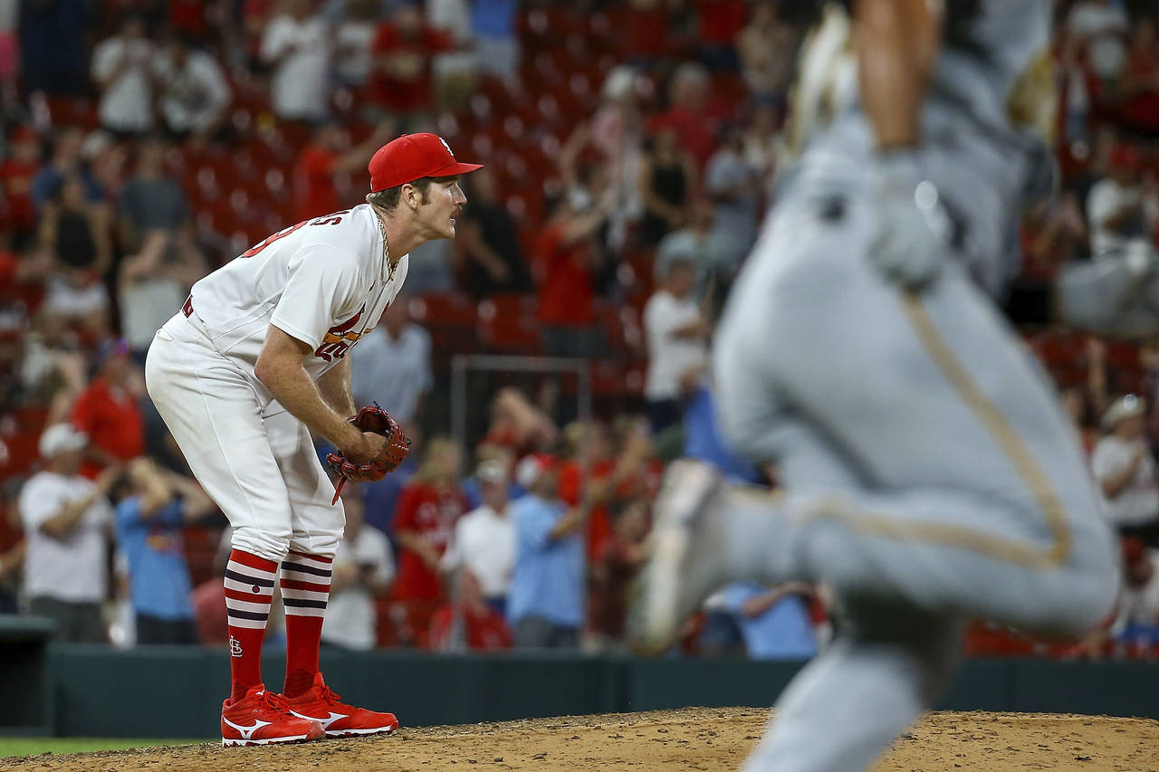 St. Louis Cardinals starting pitcher Miles Mikolas (39) watches as his no-hitter is broken up by a ...