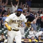 
              Milwaukee Brewers' Andrew McCutchen celebrates after hitting a walk-off RBI single during the ninth inning of a baseball game against the San Diego Padres Thursday, June 2, 2022, in Milwaukee. The Brewers won 5-4. (AP Photo/Morry Gash)
            