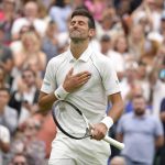 
              Serbia's Novak Djokovic celebrates after beating Korea's Kwon Soonwoo in a men's first round singles match on day one of the Wimbledon tennis championships in London, Monday, June 27, 2022. (AP Photo/Kirsty Wigglesworth)
            