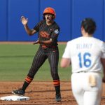 
              Oklahoma State's Chyenne Factor (9) celebrates after reaching second base during the first inning of the team's NCAA softball Women's College World Series game against Florida on Saturday, June 4, 2022, in Oklahoma City. (AP Photo/Alonzo Adams)
            
