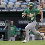 
              Oakland Athletics second baseman Nick Allen runs home to score on a single by Jonah Bride during the fourth inning of a baseball game against the Kansas City Royals Saturday, June 25, 2022, in Kansas City, Mo. (AP Photo/Charlie Riedel)
            