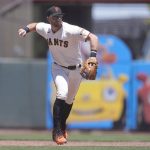 
              San Francisco Giants third baseman Evan Longoria throws out Colorado Rockies' Connor Joe at first base during the third inning of a baseball game in San Francisco, Thursday, June 9, 2022. (AP Photo/Jeff Chiu)
            