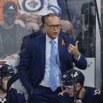 
              FILE - Winnipeg Jets head coach Paul Maurice signals to his players during the second period of a preseason NHL hockey game against the Edmonton Oilers in Winnipeg, Manitoba, Wednesday, Sept. 29, 2021. A person with knowledge of the situation said Paul Maurice and the Florida Panthers were in the process Wednesday, June 22, 2022, of finalizing a deal to make him the club's new coach. (John Woods/The Canadian Press via AP, File)
            