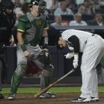 
              New York Yankees batter Anthony Rizzo, right, reacts after being hit by a pitch in the seventh inning of a baseball game against the Oakland Athletics, Monday, June 27, 2022, in New York. (AP Photo/Bebeto Matthews)
            
