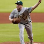 
              Oakland Athletics pitcher Jared Koenig delivers in the first inning of the team's baseball game against the Atlanta Braves on Wednesday, June 8, 2022, in Atlanta. Koenig was making his debut in the majors. (AP Photo/John Bazemore)
            