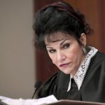 
              FILE - In this Jan. 23, 2018, file photo, Judge Rosemarie Aquilina listens to a victim statement during the sixth day of Larry Nassar's sentencing hearing in Lansing, Mich. On Friday, June 17, 2022, the Michigan Supreme Court has rejected a final appeal from Nassar,  who was sentenced to decades in prison for sexually assaulting gymnasts, including Olympic medalists. (Dale G. Young/Detroit News via AP, File)
            