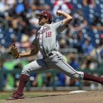 
              Texas A&M starting pitcher Ryan Prager (18) throws against Oklahoma in the third inning during an NCAA College World Series baseball game Wednesday, June 22, 2022, in Omaha, Neb. (AP Photo/John Peterson)
            