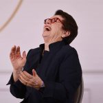 
              American tennis legend Billie Jean King laughs before being awarded with the Legion d'Honneur by French President Emmanuel Macron at the Elysee Palace Friday, June 3, 2022 in Paris. A ceremony Thursday at the Roland Garros stadium marked the 50th anniversary of her French Open win.(AP Photo/Jean-Francois Badias, Pool)
            