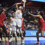 
              Connecticut Sun center Brionna Jones (42) shoots next to Atlanta Dream forward Cheyenne Parker (32) during a WNBA basketball game Wednesday, June 15, 2022, in Uncasville, Conn. (Sarah Gordon/The Day via AP)
            