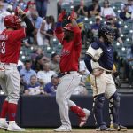 
              Philadelphia Phillies' Odubel Herrera is congratulated bt Bryce Harper after hitting a two-run home run during the ninth inning of a baseball game against the Milwaukee Brewers Thursday, June 9, 2022, in Milwaukee. (AP Photo/Morry Gash)
            