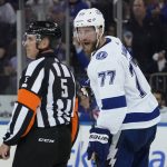 
              Tampa Bay Lightning defenseman Victor Hedman (77) argues with referee Chris Rooney (5) after being given a two minute penalty for tripping in the third period of Game 2 of the NHL hockey Stanley Cup playoffs Eastern Conference finals, Friday, June 3, 2022, in New York. (AP Photo/John Minchillo)
            