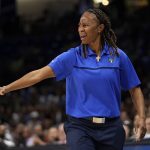 
              Dallas Wings coach Vickie Johnson gestures to an official during the second half of the team's WNBA basketball game against the Phoenix Mercury, Friday, June 17, 2022, in Arlington, Texas. (AP Photo/Tony Gutierrez)
            