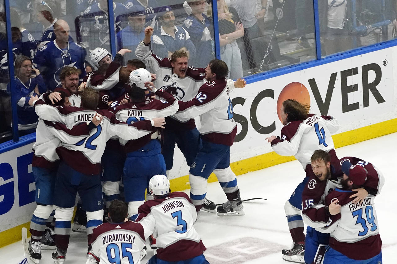The Colorado Avalanche celebrate after the team defeated the Tampa Bay Lightning in Game 6 of the N...