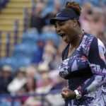 
              Serena Williams of the United States celebrates after scoring a point during their doubles tennis match with Ons Jabeur of Tunisia against Marie Bouzkova of Czech Republic and Sara Sorribes Tormo of Spain at the Eastbourne International tennis tournament in Eastbourne, England, Tuesday, June 21, 2022. (AP Photo/Kirsty Wigglesworth)
            