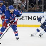 
              New York Rangers left wing Artemi Panarin (10) sets up a shot against Tampa Bay Lightning left wing Alex Killorn (17) in the first period of Game 2 of the NHL hockey Stanley Cup playoffs Eastern Conference finals, Friday, June 3, 2022, in New York. (AP Photo/John Minchillo)
            
