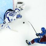 
              Tampa Bay Lightning goaltender Andrei Vasilevskiy (88) makes a save against Colorado Avalanche center Nathan McKinnon (29) during the first period in Game 5 of the NHL Stanley Cup Final on Friday, June 24, 2022, in Denver. (AP Photo/Jack Dempsey)
            