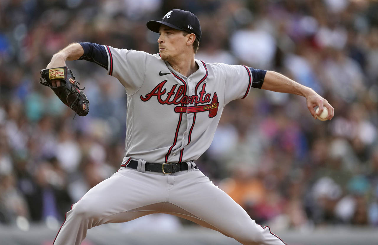 Atlanta Braves starting pitcher Max Fried works against the Colorado Rockies during the first innin...