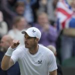 
              Britain's Andy Murray celebrates winning the third set during the singles tennis match against John Isner of the US on day three of the Wimbledon tennis championships in London, Wednesday, June 29, 2022. (AP Photo/Alastair Grant)
            