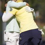 
              Jin Young Ko, of South Korea, left, and Ingrid Lindblad, of Sweden, embrace after their round during the third round of the U.S. Women's Open golf tournament at the Pine Needles Lodge & Golf Club in Southern Pines, N.C., on Saturday, June 4, 2022. (AP Photo/Steve Helber)
            