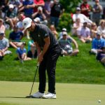 
              Xander Schauffele putts on the eighth green during the first round of the Travelers Championship golf tournament at TPC River Highlands, Thursday, June 23, 2022, in Cromwell, Conn. (AP Photo/Seth Wenig)
            