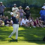 
              Rory McIlroy, of Northern Ireland, hits onto the green at the fourth hole at The Country Club, Monday, June 13, 2022, in Brookline, Mass., during a practice round ahead of the U.S. Open golf tournament. (AP Photo/Robert F. Bukaty)
            