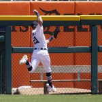 
              Detroit Tigers left fielder Kody Clemens is unable to play Minnesota Twins' Nick Gordon's RBI double during the fourth inning of a baseball game, Thursday, June 2, 2022, in Detroit. (AP Photo/Carlos Osorio)
            