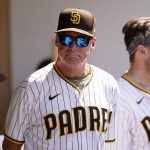 
              San Diego Padres manager Bob Melvin, center, looks on from the dugout during the fifth inning of a baseball game against the Arizona Diamondbacks, Wednesday, June 22, 2022, in San Diego. (AP Photo/Gregory Bull)
            