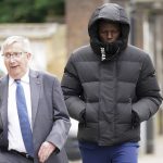 
              Yoan Zouma, right, the brother of West Ham defender Kurt Zouma arrives at Thames Magistrates' Court in London, Wednesday, June 1, 2022, where Kurt will be sentenced for kicking and slapping his pet cat in abuse caught on video. (Yui Mok/PA via AP)
            