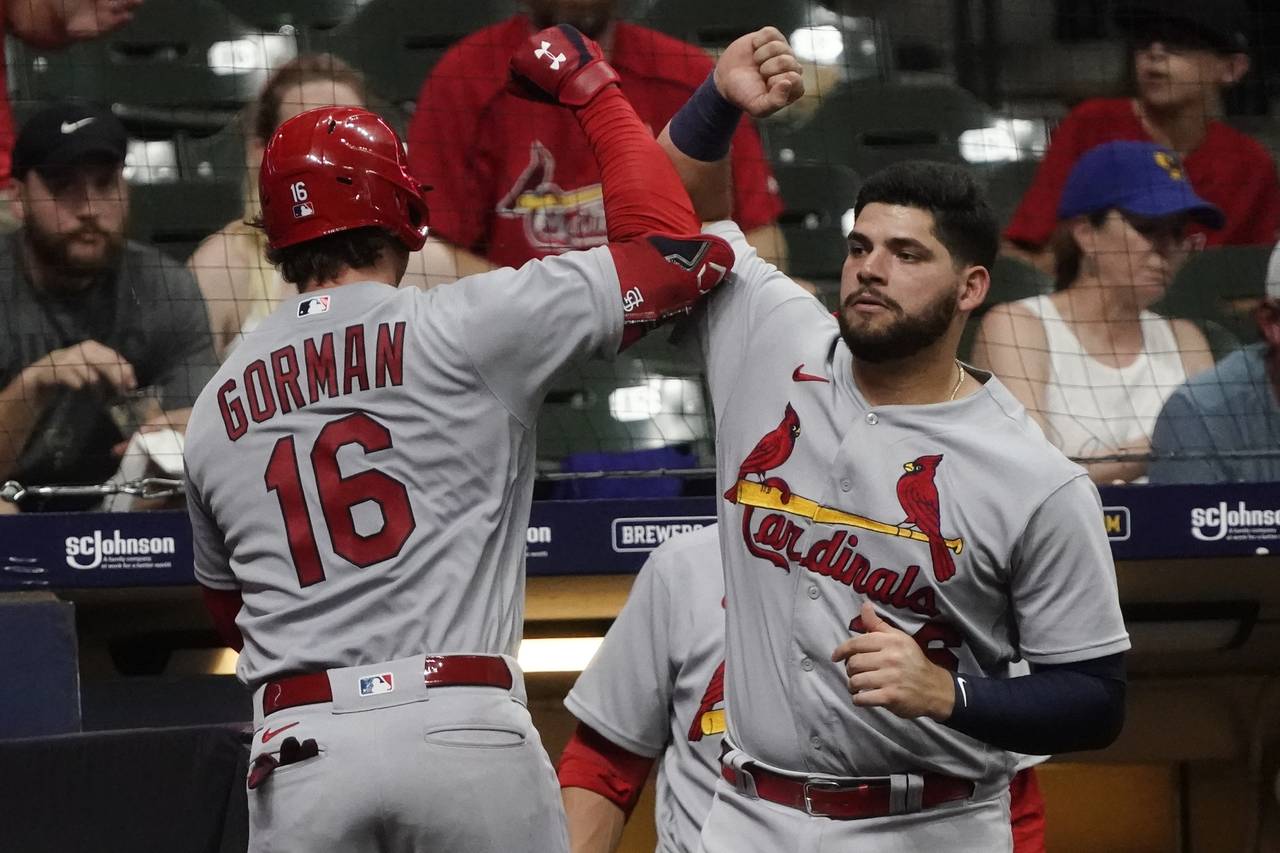 St. Louis Cardinals' Nolan Gorman is congratulated by Juan Yepez after hitting a home run during th...
