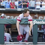 
              Oklahoma closing pitcher Trevin Michael watches as Mississippi players celebrate their win in Game 2 of the NCAA College World Series baseball finals, Sunday, June 26, 2022, in Omaha, Neb. (AP Photo/Rebecca S. Gratz)
            