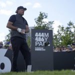 
              Phil Mickelson of the United States waits to play his tee shot on the 16th hole during the final round of the inaugural LIV Golf Invitational at the Centurion Club in St Albans, England, Saturday, June 11, 2022. (AP Photo/Alastair Grant)
            