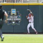 
              Stanford right fielder Braden Montgomery (6) misses catching the ball against Arkansas in the first inning during an NCAA College World Series baseball game Saturday, June 18, 2022, in Omaha, Neb. (AP Photo/John Peterson)
            